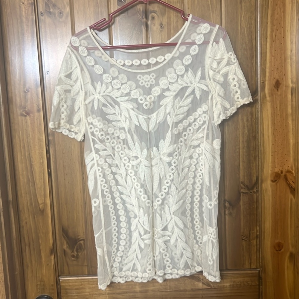 Cream color, sheer top